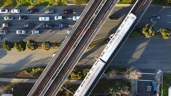 An aerial shot of the Bay Area Rapid Transit on the railways
