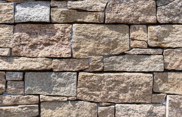 istock Texture from imitation stones, modern cladding of the exterior wall 1439775343