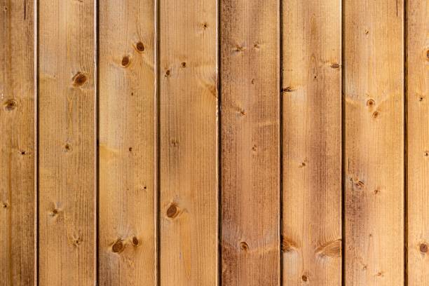 istock Surface made of vertically laid wooden, light planks 1439775420
