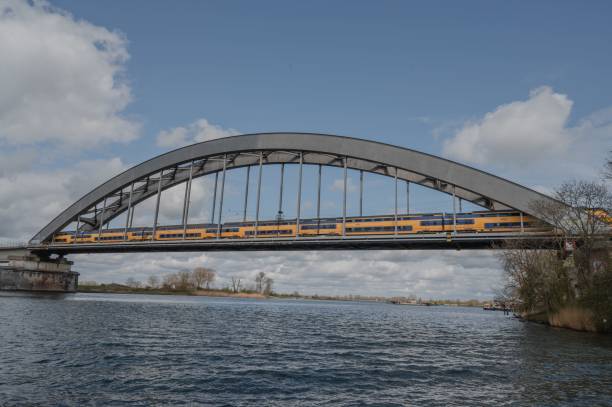 istock White Bridge over a background of a cloudy sky 1439776864