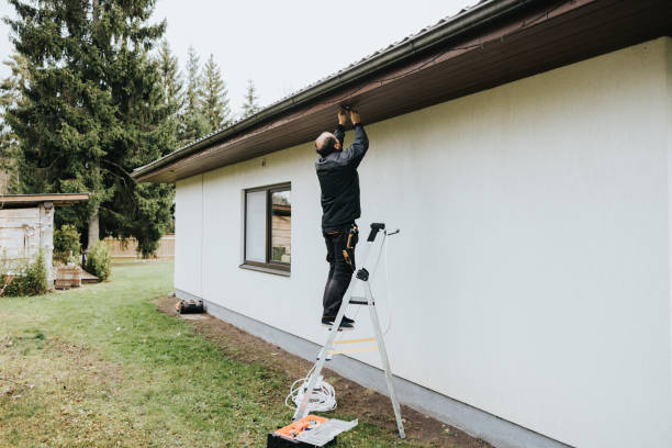 istock Electrician installing lamps 1439777476