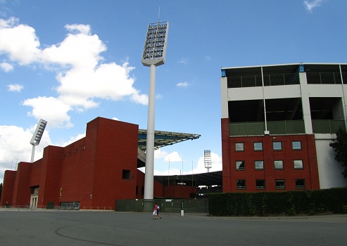 Brussels, Belgium – July 29, 2012: Outside King Baudouin Stadium in Brussels, formerly known as Heysel Stadium. Football/soccer pitch, on a sunny summer day.