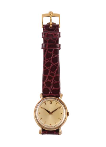 Modern watch with a red leather band under the lights isolated on a white background