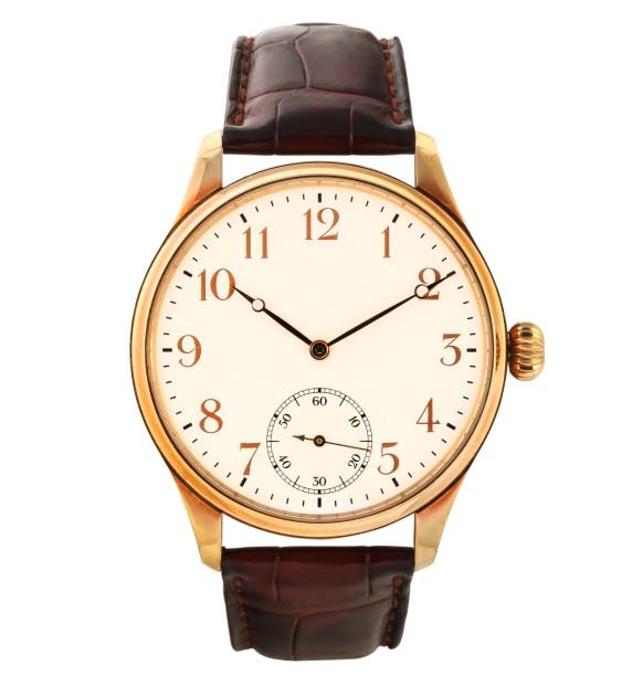 istock Modern watch with a brown leather band under the lights isolated on a white background 1439780346