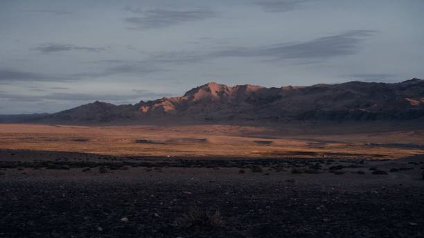 istock Mesmerizing view of mountain range at sunset 1439781610