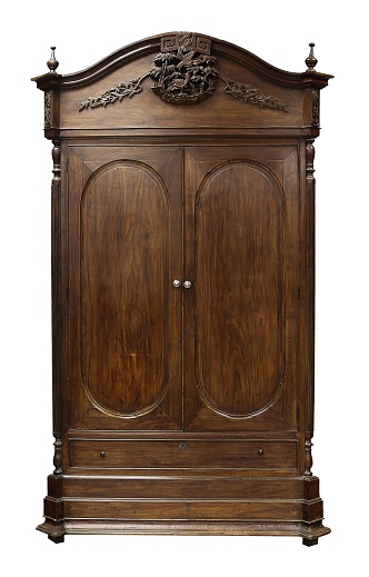 A wooden vintage cabinet on white background