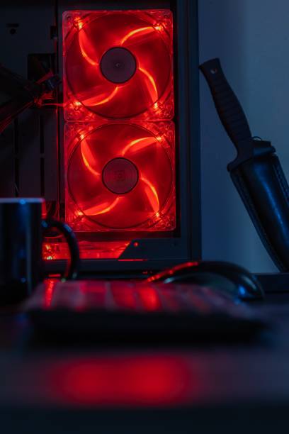 istock Red cooling fans glowing in a desktop computer 1439785627