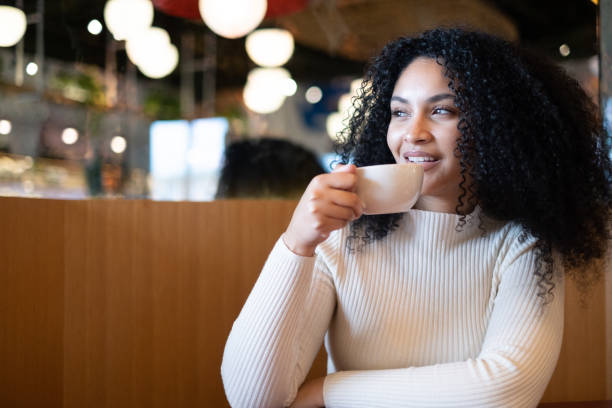 istock Sitting Alone Dessert Cafe Restaurant Coffee Tea Sipping 1439785886