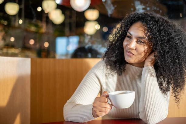 istock Sitting Alone Dessert Cafe Restaurant Coffee Tea Sipping 1439785962
