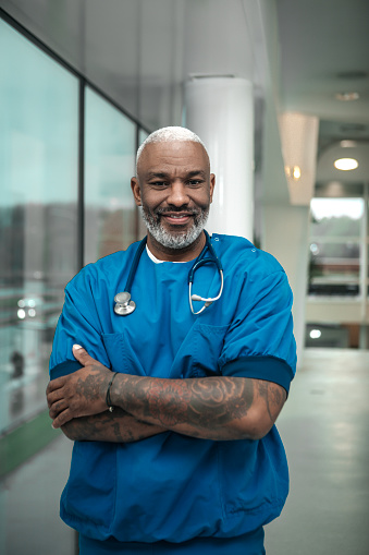 Portrait of a black male nurse in a realistic hospital setting