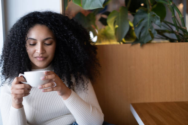 istock Sitting Alone Dessert Cafe Restaurant Coffee Tea Sipping 1439786125