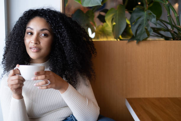 istock Sitting Alone Dessert Cafe Restaurant Coffee Tea Sipping 1439786132