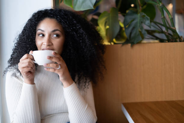 istock Sitting Alone Dessert Cafe Restaurant Coffee Tea Sipping 1439786138