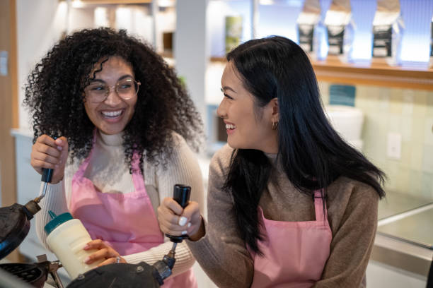 istock Diverse Group Employee Friends Enjoy Coffee Shop Cafe Work Employee Worker Waffle Making Lattes Cappuccinos 1439786824