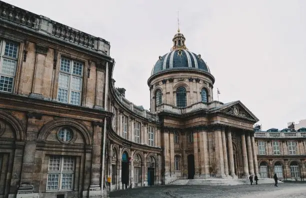 Photo of Famous Institut de France in Paris on a gloomy day