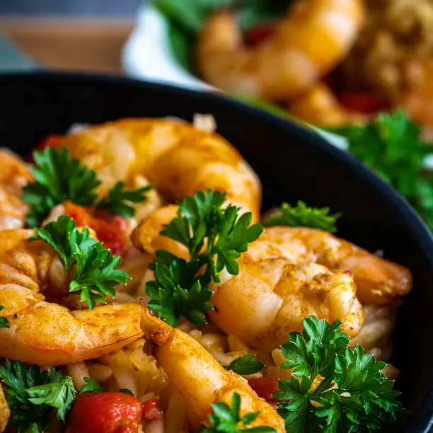 One-pot recipes are increasingly popular with home cooks seeking quick and convenient meals. In less than 30 minutes,  shrimp scampi and orzo pasta is cooked -- and then served -- in a cast-iron skillet. It's garnished with grape tomatoes and parsley to add color and freshness.