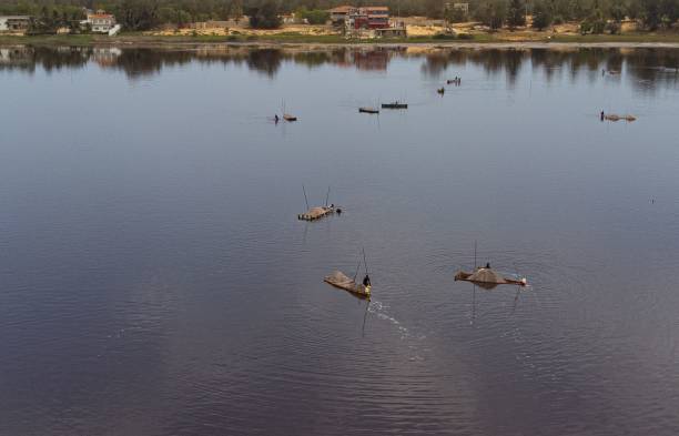 istock Salt extraction workers in Retba lake, Senegal 1439790465