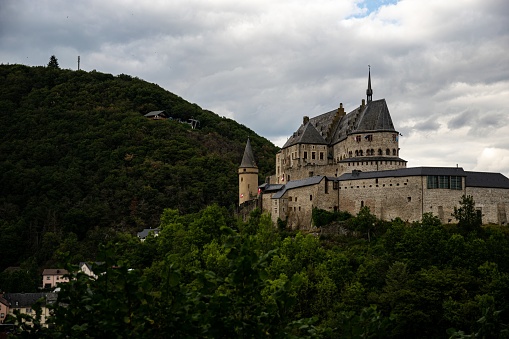 Vianden, Luxembourg – August 15, 2019: A beautiful historic castle looking like a scene from a fairytale in  Vianden, Luxemburg