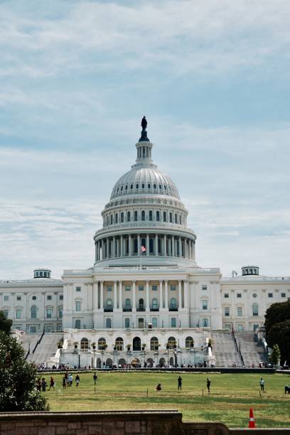Vertical shot of the famous United States Capitol Building in Washington, D.C., United States A vertical shot of the famous United States Capitol Building in Washington, D.C., United States maryland state colors stock pictures, royalty-free photos & images