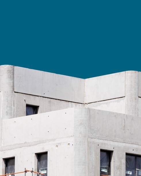 istock Vertical shot of a white concrete building under the blue sky 1439790744