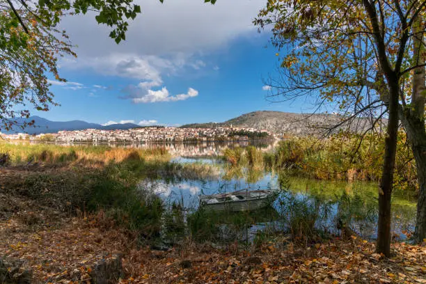 Autumn color landscape view of Lake Orestiada and the city of Kastoria in northern Greece