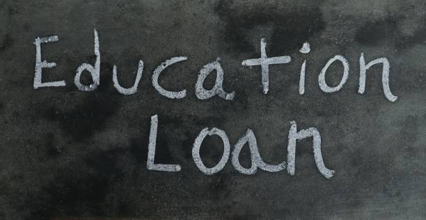 istock Education Loan Phrase Written on Blackboard with White Chalk 1439792266