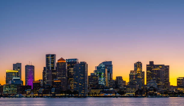 view of the boston downtown skyline at sunset, massachusetts, usa - boston skyline night city imagens e fotografias de stock