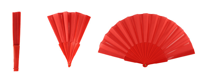 Red hand fan opening proces. Fold and unfold traditional hand fan