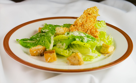 Ceasar Salad with croutons on plate