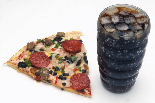 Pepperoni & Sausage pizza with an iced cola drink