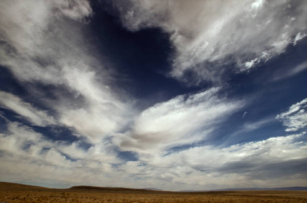 Cloudscape dominates the sky stock photo