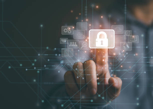 istock Person finger touching the key lock to lock or unlock the security technology system. 1439798140