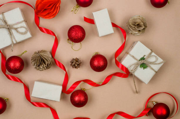 istock Christmas background with gift boxes red baubles and ribbon 1439800021