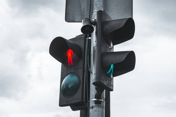 istock Red and green lights on a double pedestrian semaphore 1439800620
