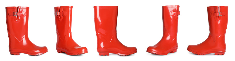 Set with red rubber boots on white background. Banner design