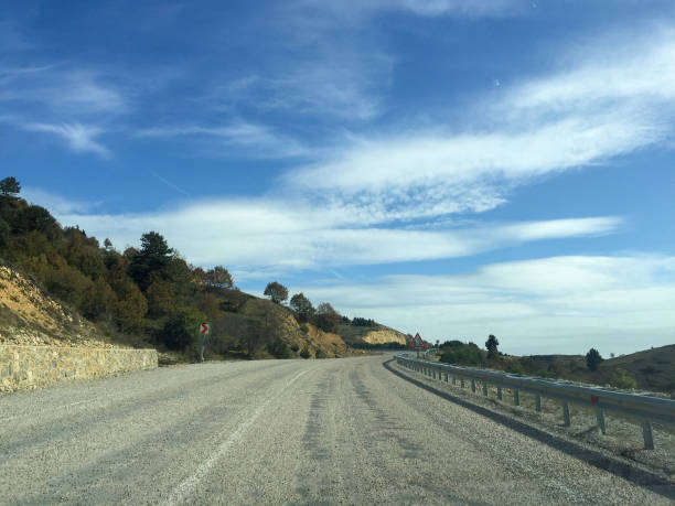 istock Driving on country road 1439801889