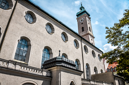 Monument to the Franz Joseph Haydn in the background of Sankt Mariahilf/Barnabites Church, Vienna, Austria