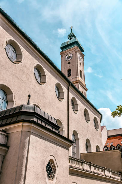 istock Side Low Angle View View Of Heilig-Geist-Kirche Clocktower In Munich, Germany 1439803760