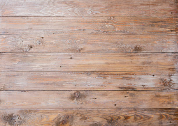Wooden raw planks timber texture backdrop.