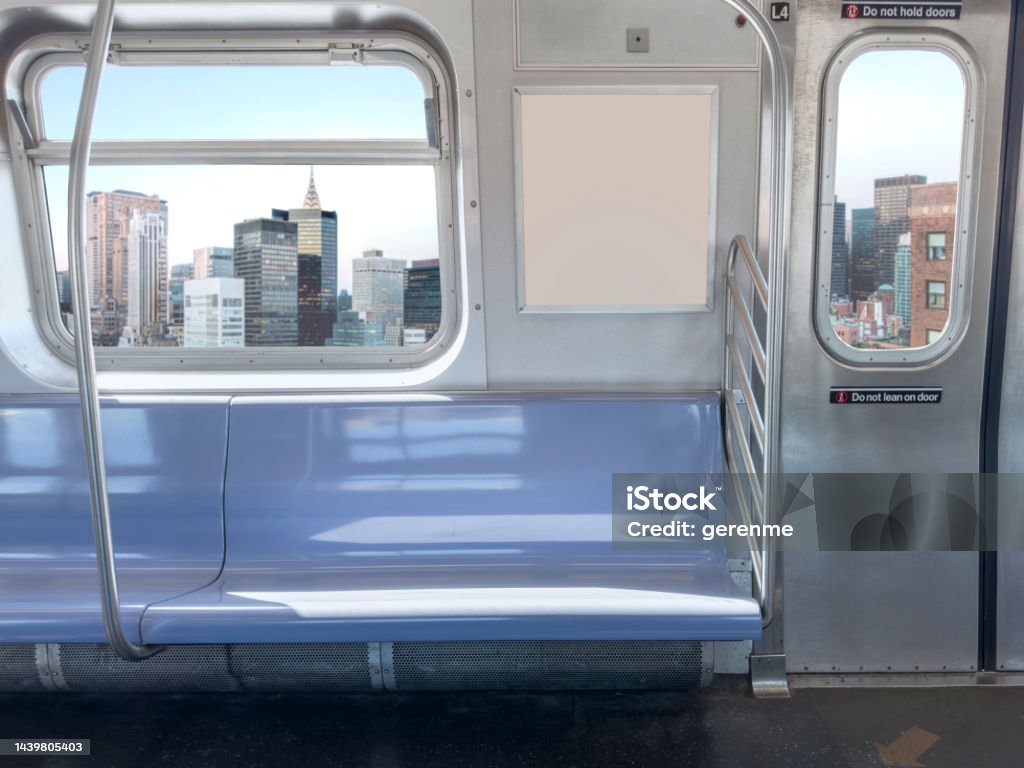 Subway seats and blank billboard Subway seats and blank billboard in New York Subway Stock Photo