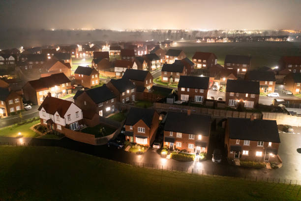 aerial view of houses in england at night - housing development birmingham uk row house imagens e fotografias de stock