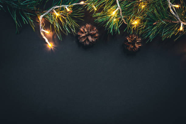 istock Christmas background with Christmas tree branches and garland, flat lay. 1439806906
