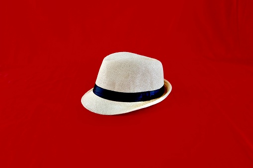 hat on red background