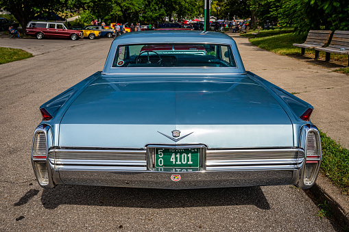 Des Moines, IA - July 02, 2022: High perspective rear view of a 1964 Cadillac Coupe DeVille at a local car show.