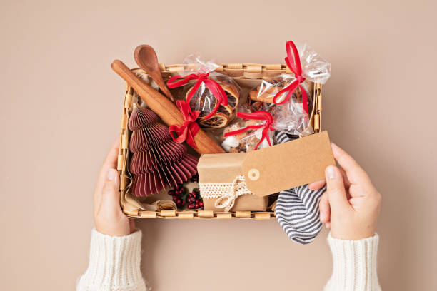 Refined Christmas gift box for culinary enthusiats with spices and kitchen utensils. Corporate or personal present for cooking lovers, foodies and gourmands.