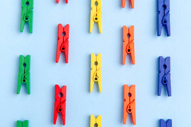 istock Formation of objects, repetitive group of clothespin colorful pattern, crowd top view 1439813018