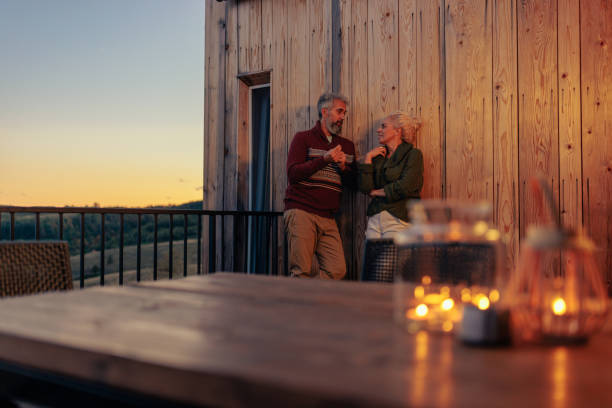 istock Senior couple on mountain vacation. 1439813079