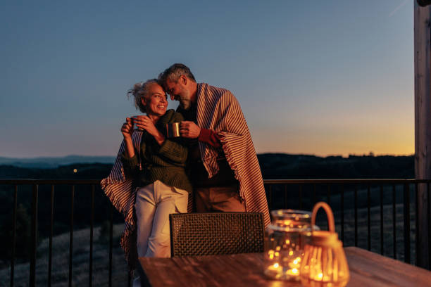 istock Senior couple outdoors on autumn evening. 1439813326