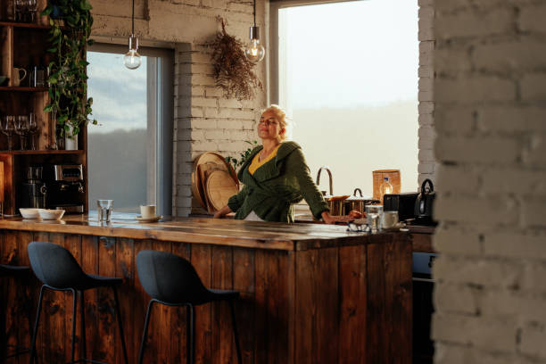 istock Relaxed senior woman at home. 1439816069
