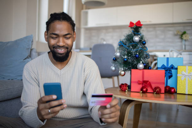 istock Man celebrating Christmas Eve at home 1439817215